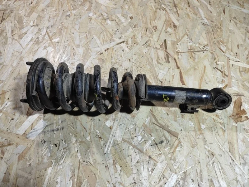 Амортизатор передний левый Mitsubishi L200 (2006-2015) 2012 MR992321 ПИКАП 2.5 D 4D56