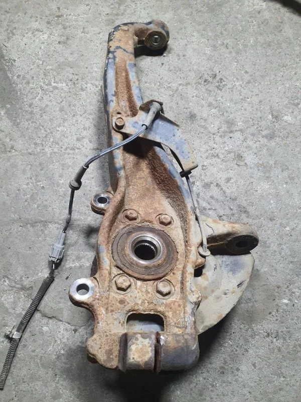 Кулак поворотный левый Nissan Navara (D40) 2004-2015 2013 400155X00C ПИКАП 2.5 D YD25DDTI