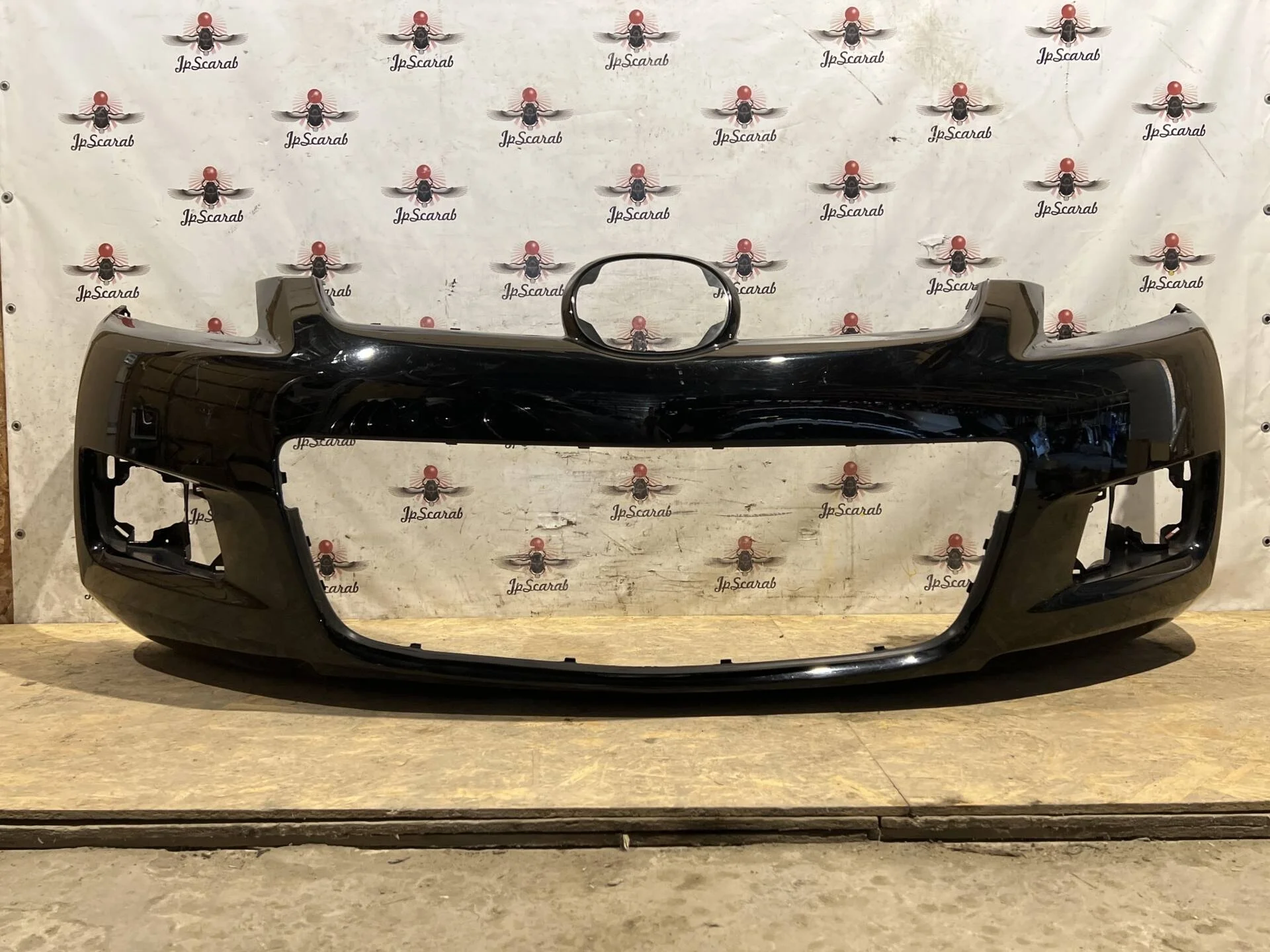 Бампер передний Mazda CX-7 ER