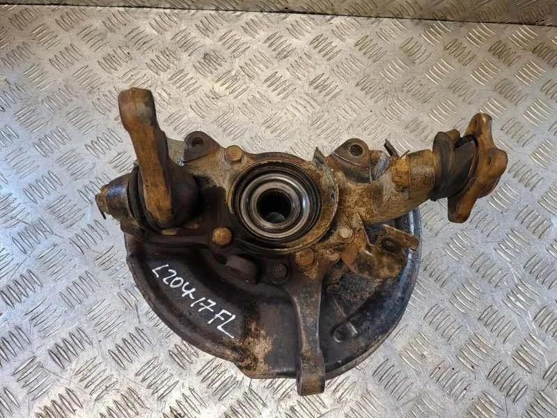 Кулак поворотный левый Mitsubishi L200 (2006-2015) 2012 3870A109 2.5 D 4D56