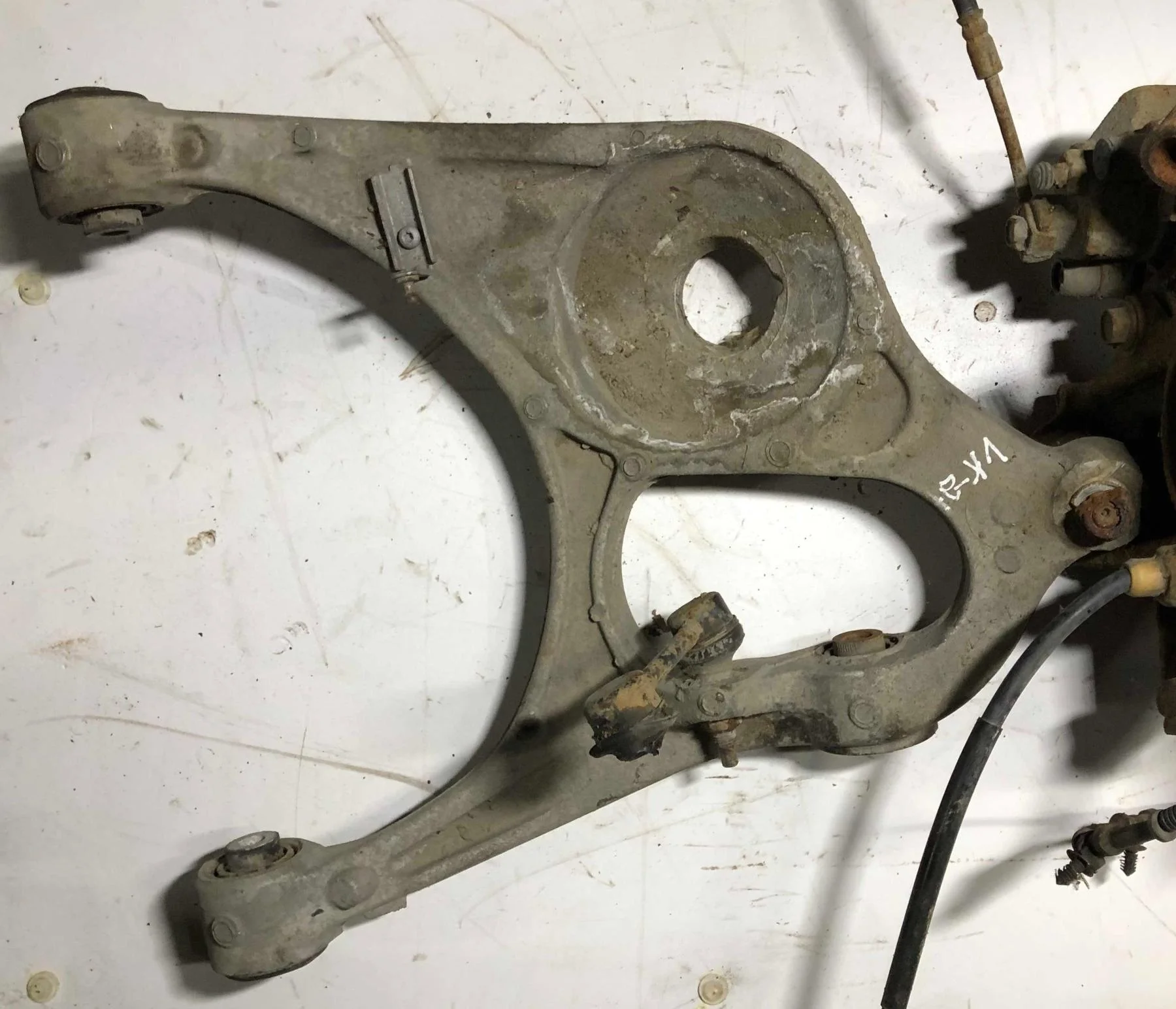 Рычаг подвески задний н 124219