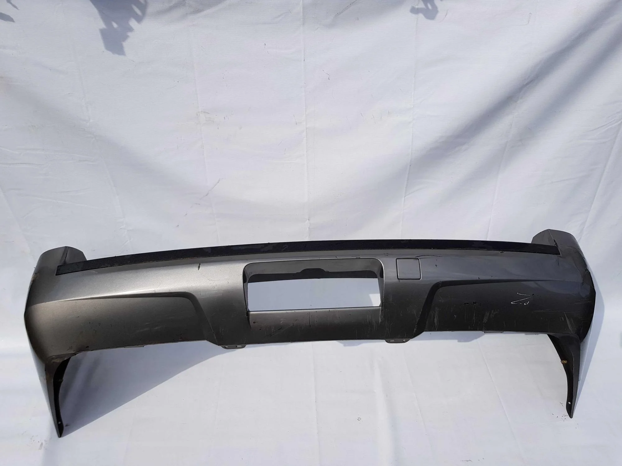 Бампер задний Chevrolet Tahoe 20951793 100561