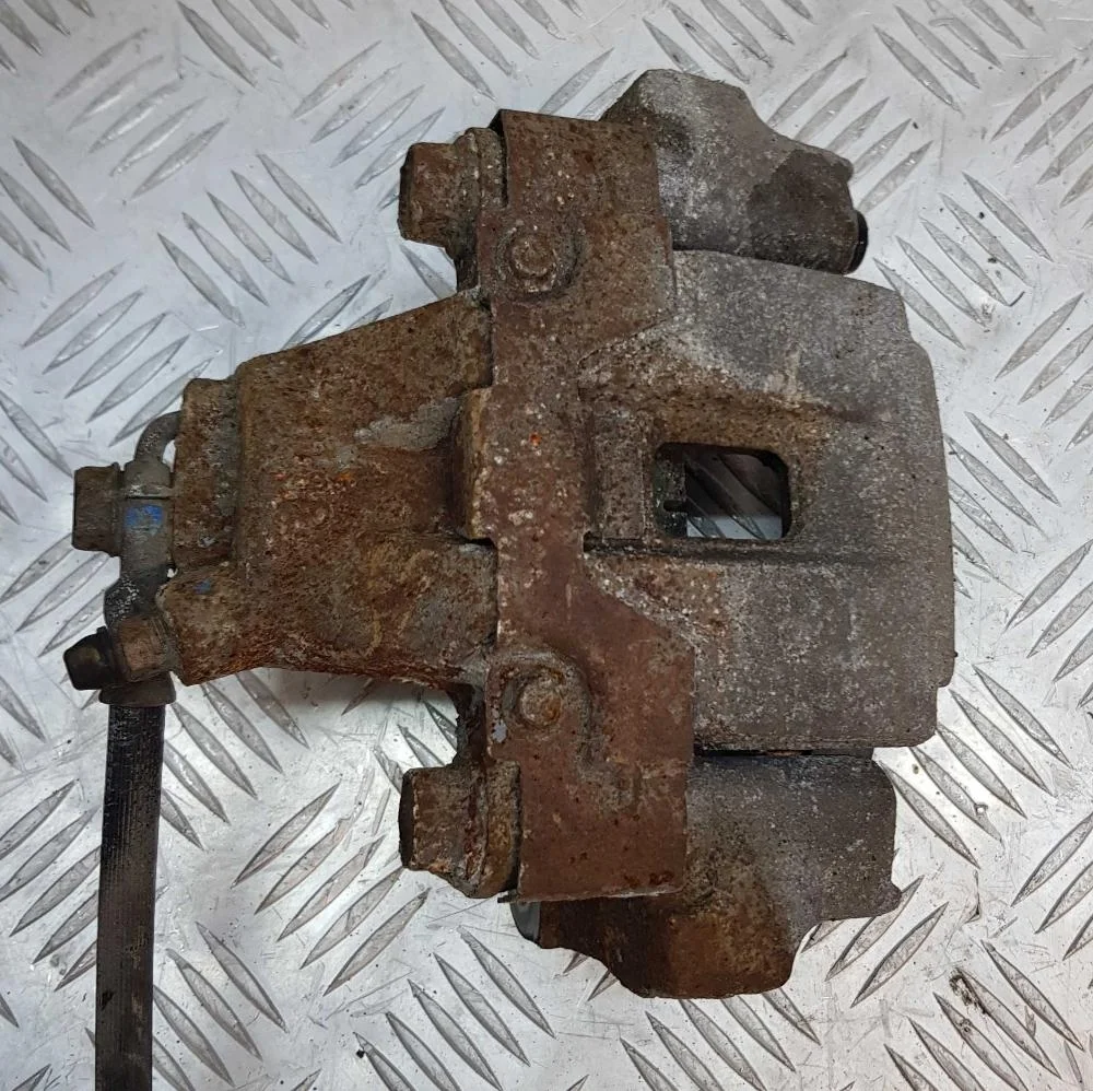 Суппорт тормозной задний левый Toyota Land  116212