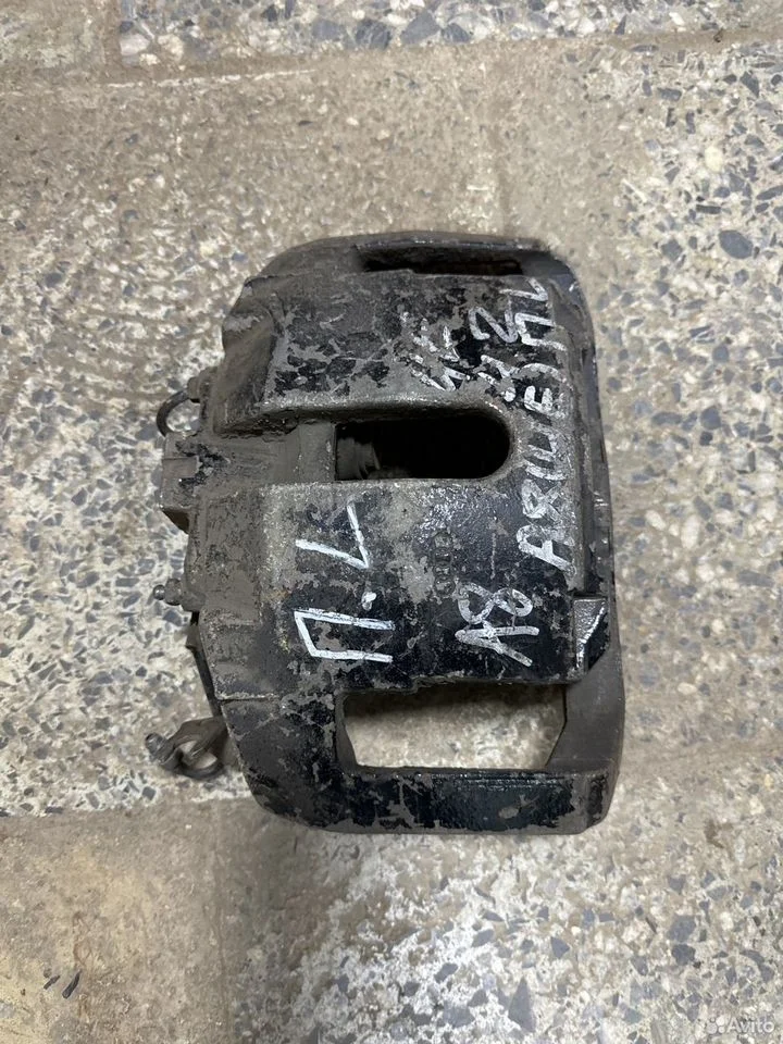 Суппорт тормозной передний левый vag