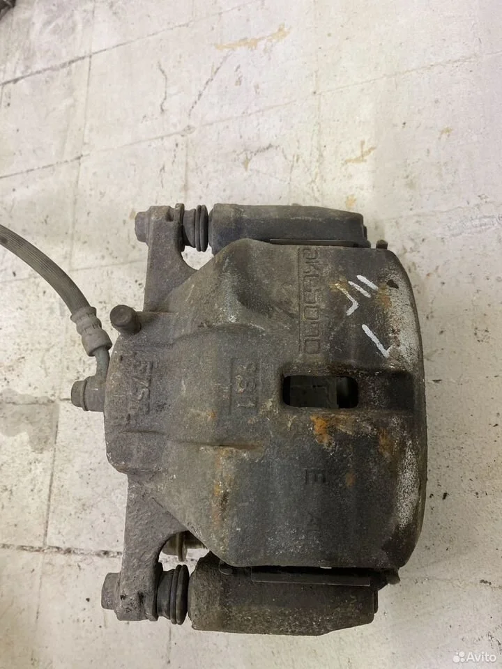 Суппорт передний левый nissan x-trail t32