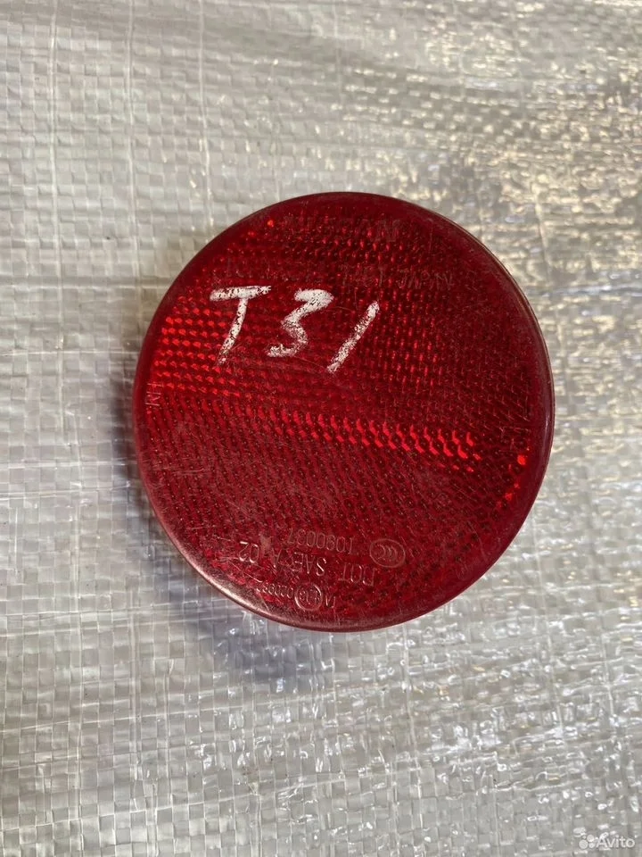 Катафот заднего бампера nissan