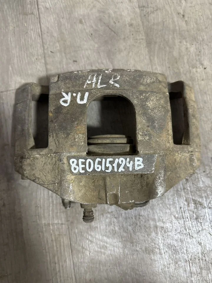 Суппорт тормозной передний правый vag