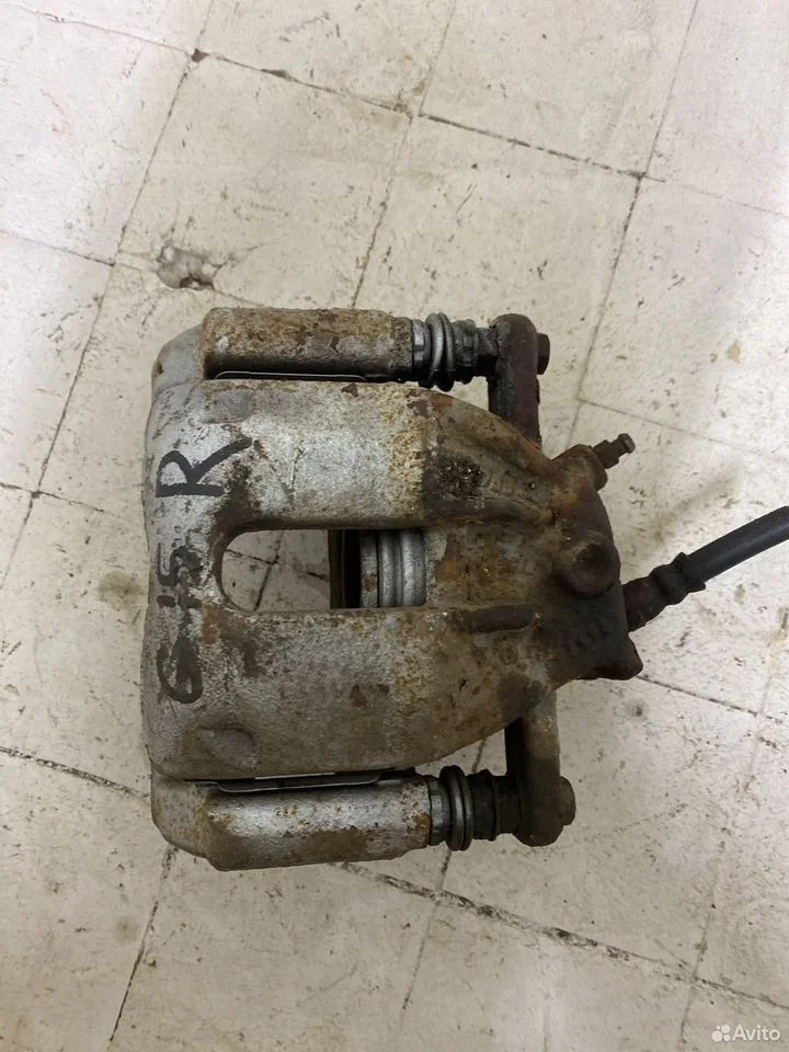 Суппорт тормозной передний правый nissan almera g1