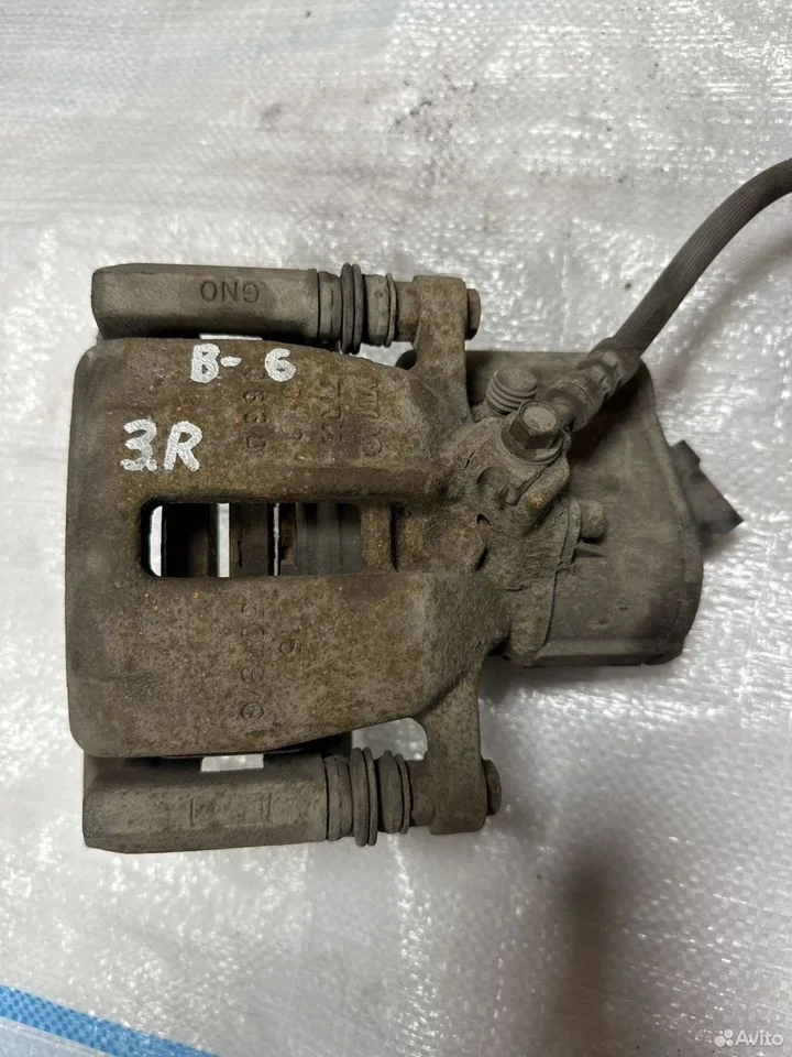 Суппорт задний правый vag