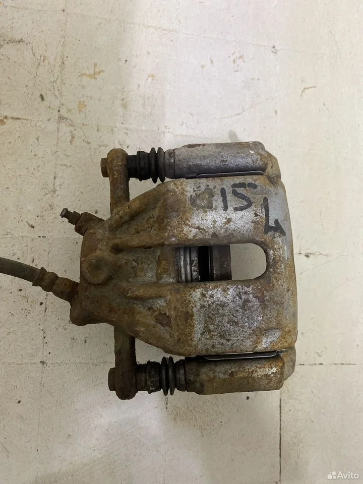 Суппорт тормозной передний левый nissan almera g15