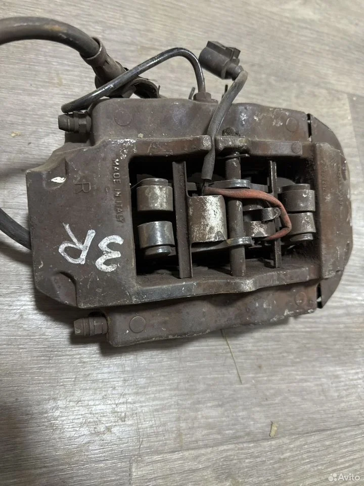 Суппорт тормозной задний правый vag