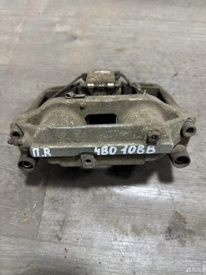 Суппорт тормозной передний правый vag