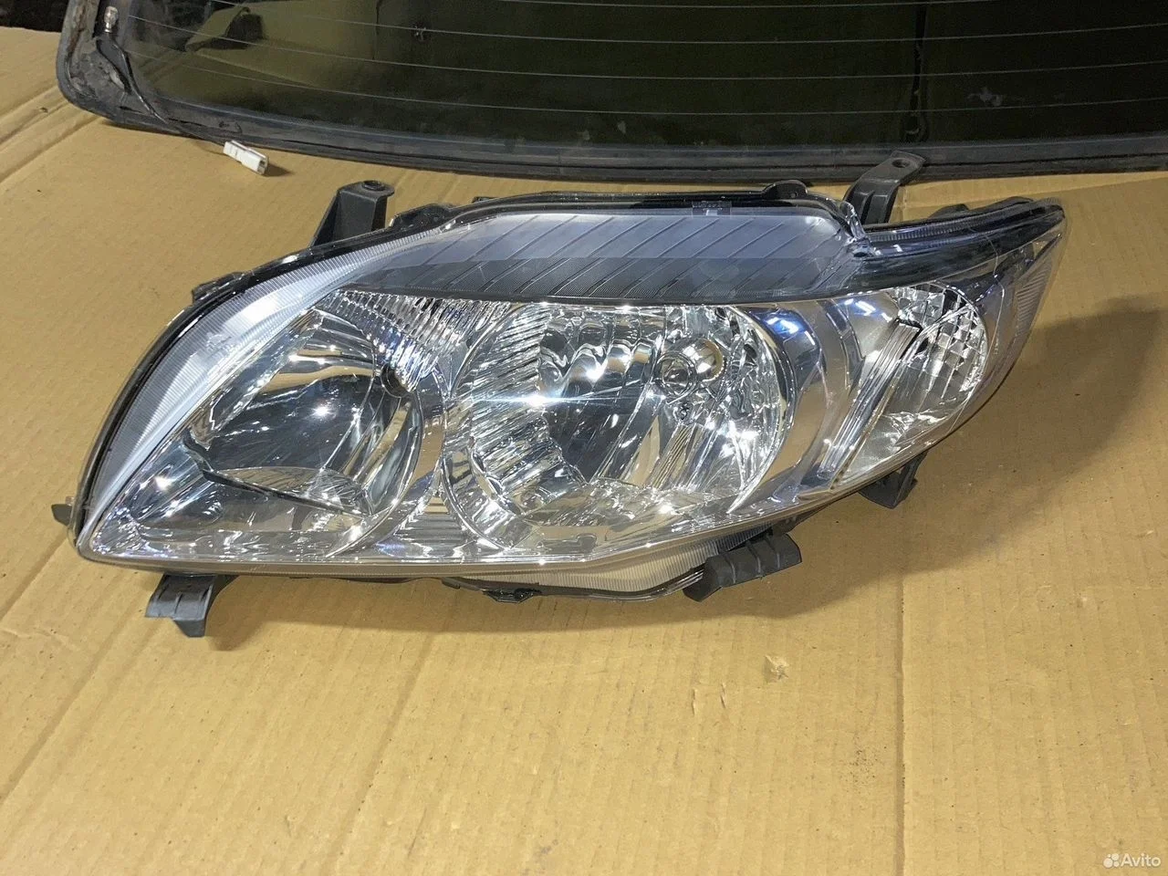 Фара левая toyota corolla 150