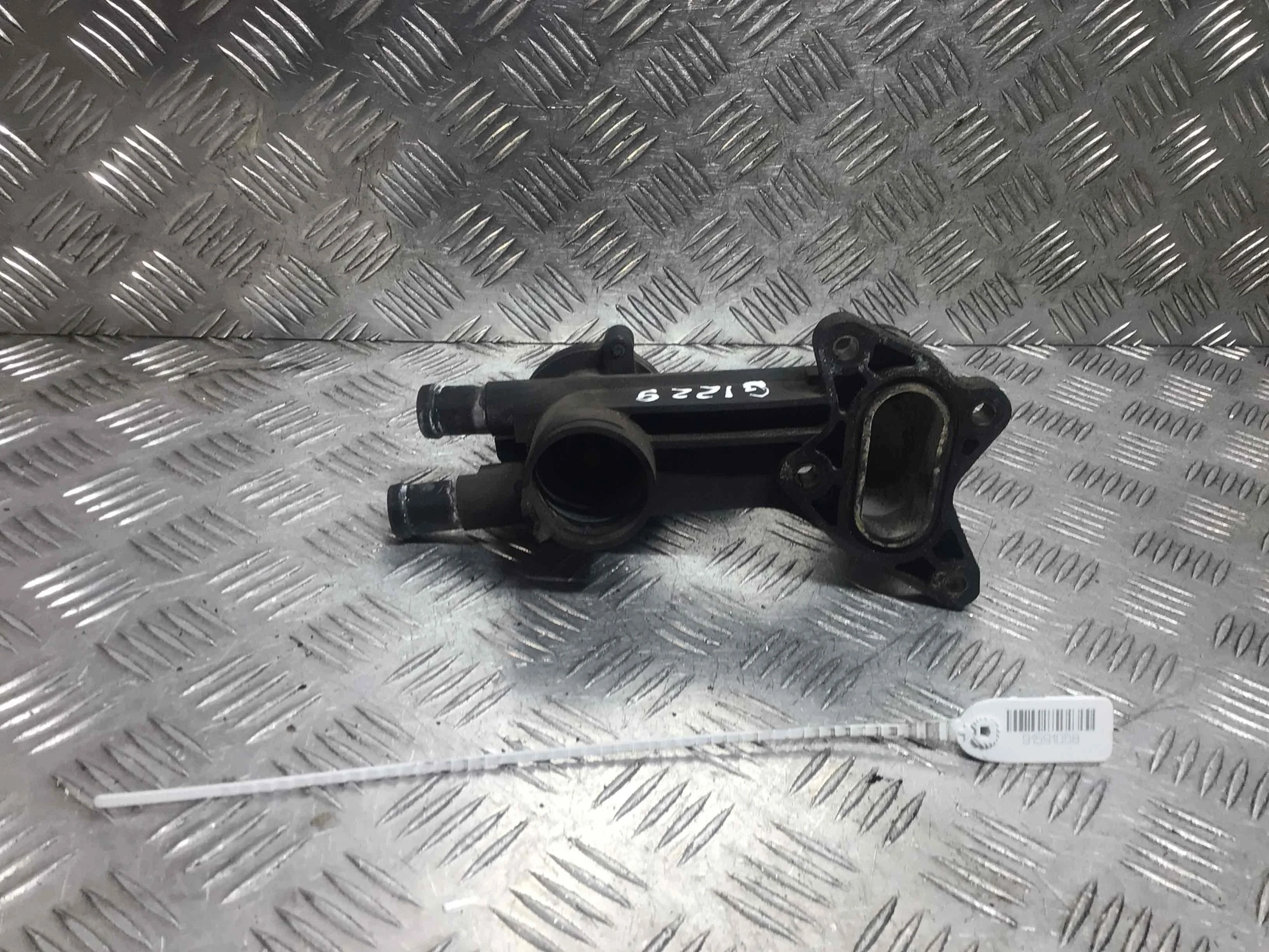 Корпус термостата Volkswagen Polo 4 поколение (2001-2005) бензин 1.2 i Механика Х/б