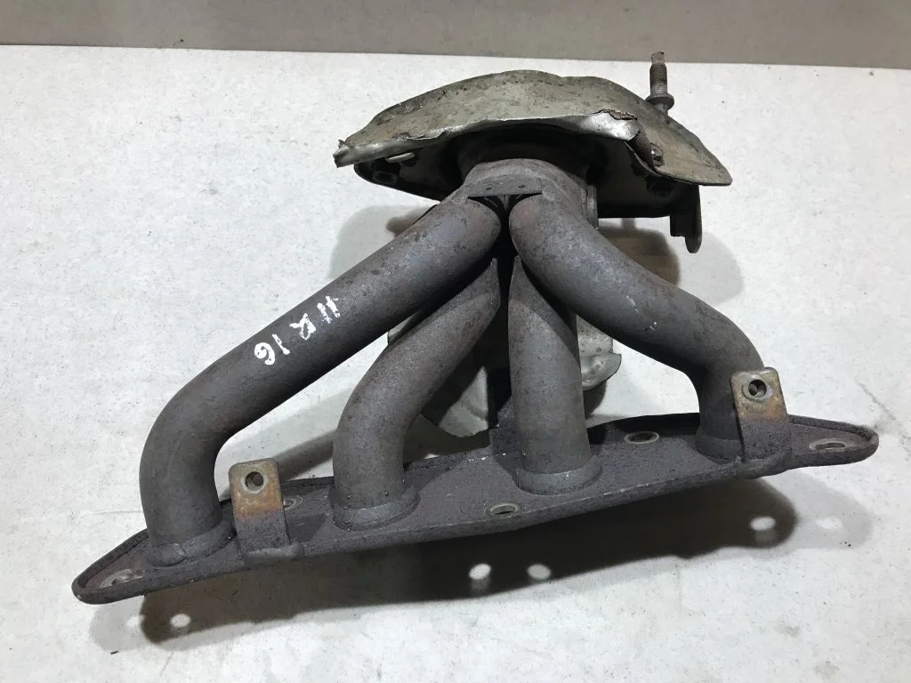 Коллектор выпускной Nissan Note E11