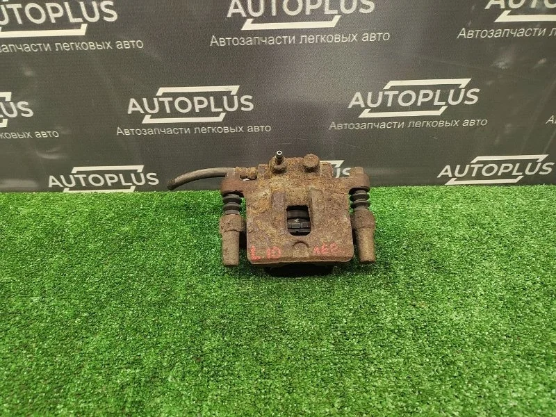 Суппорт Mitsubishi Lancer 2009 4605A477 X СЕДАН 1.8 4B10, задний левый