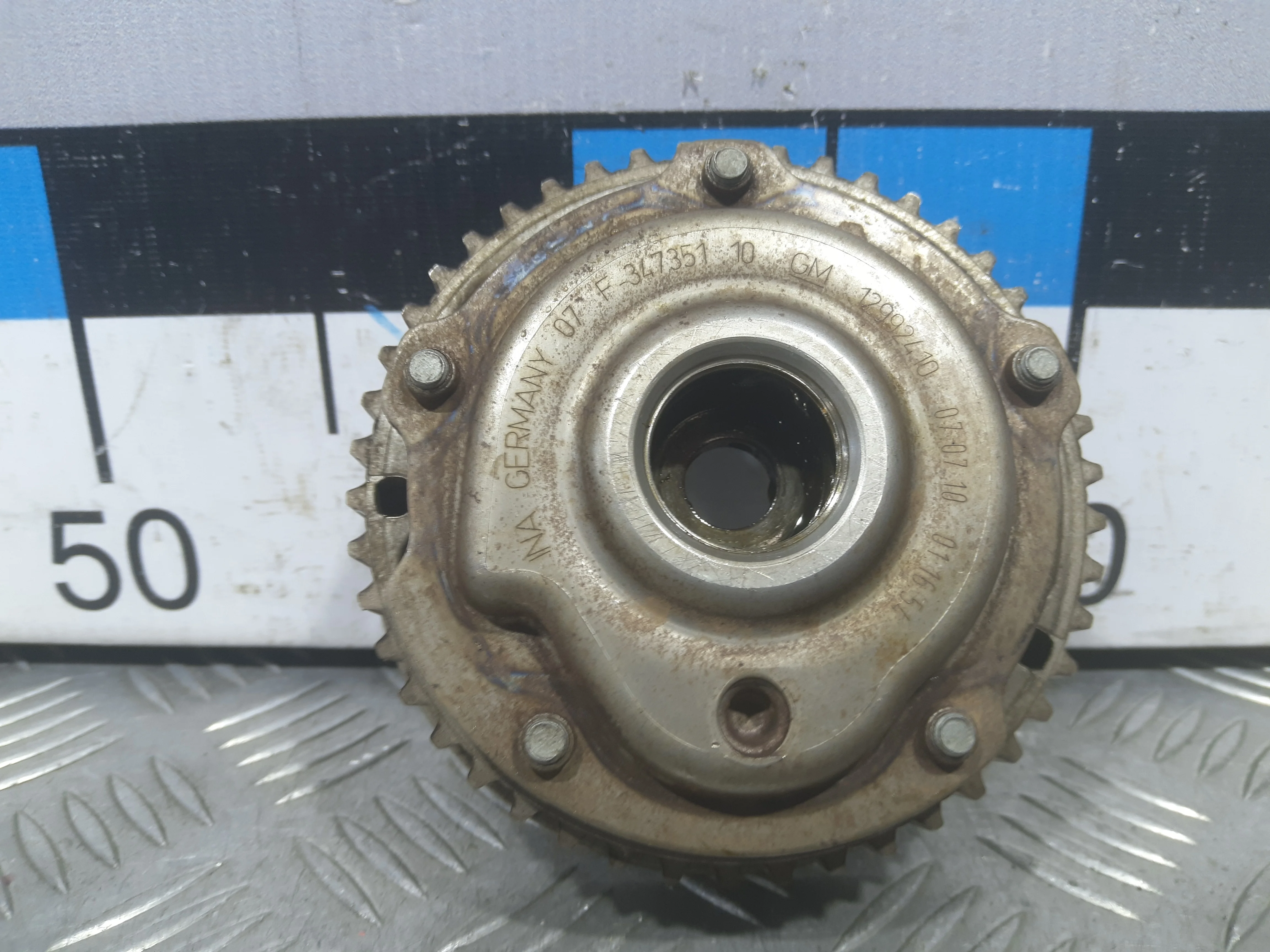 [Б/У] Механизм изменения фаз ГРМ выпуск [Код: 00446085 ]