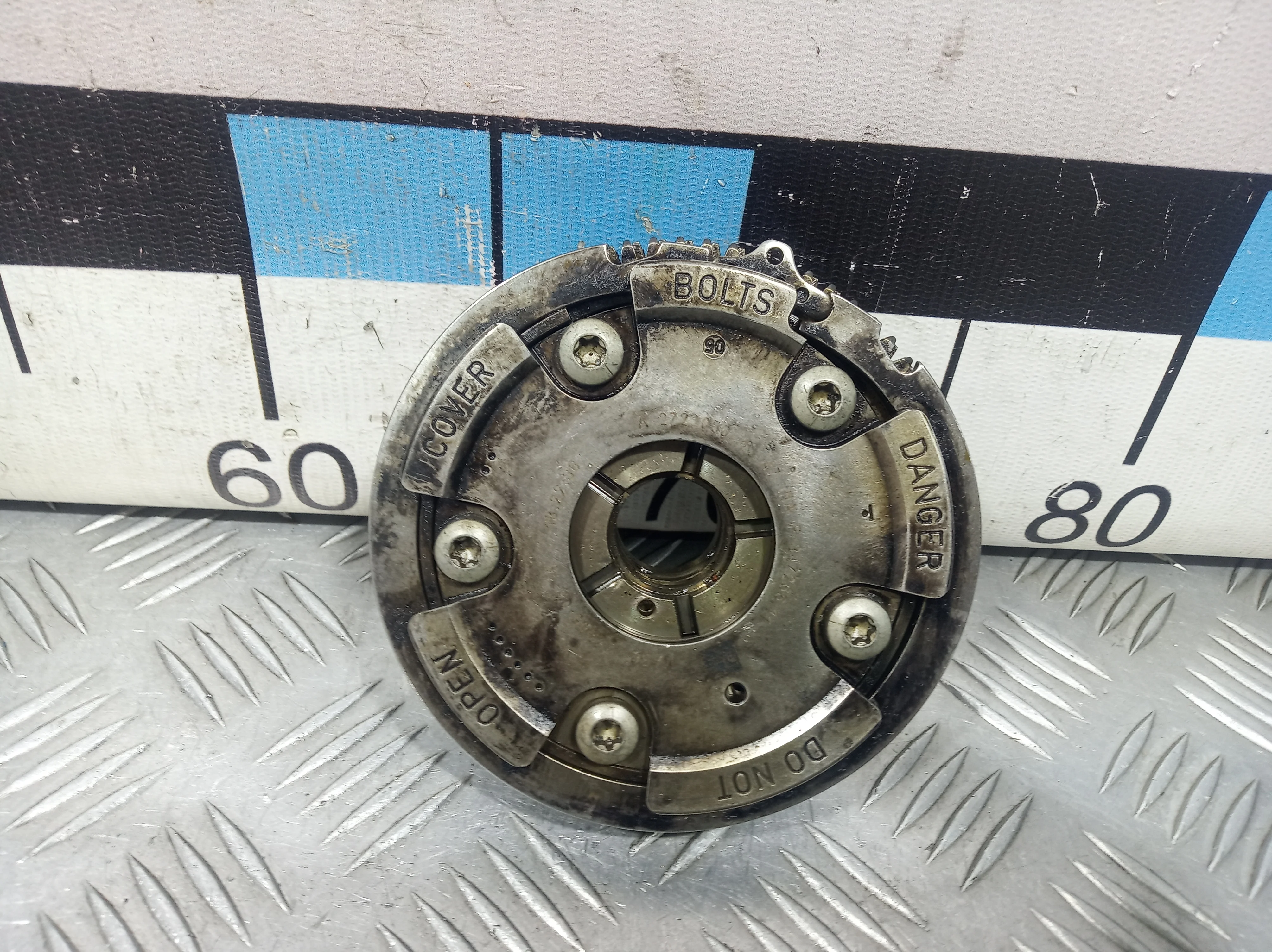 [Б/У] Механизм изменения фаз ГРМ левый (выпуск) [Код: 00295541 ]