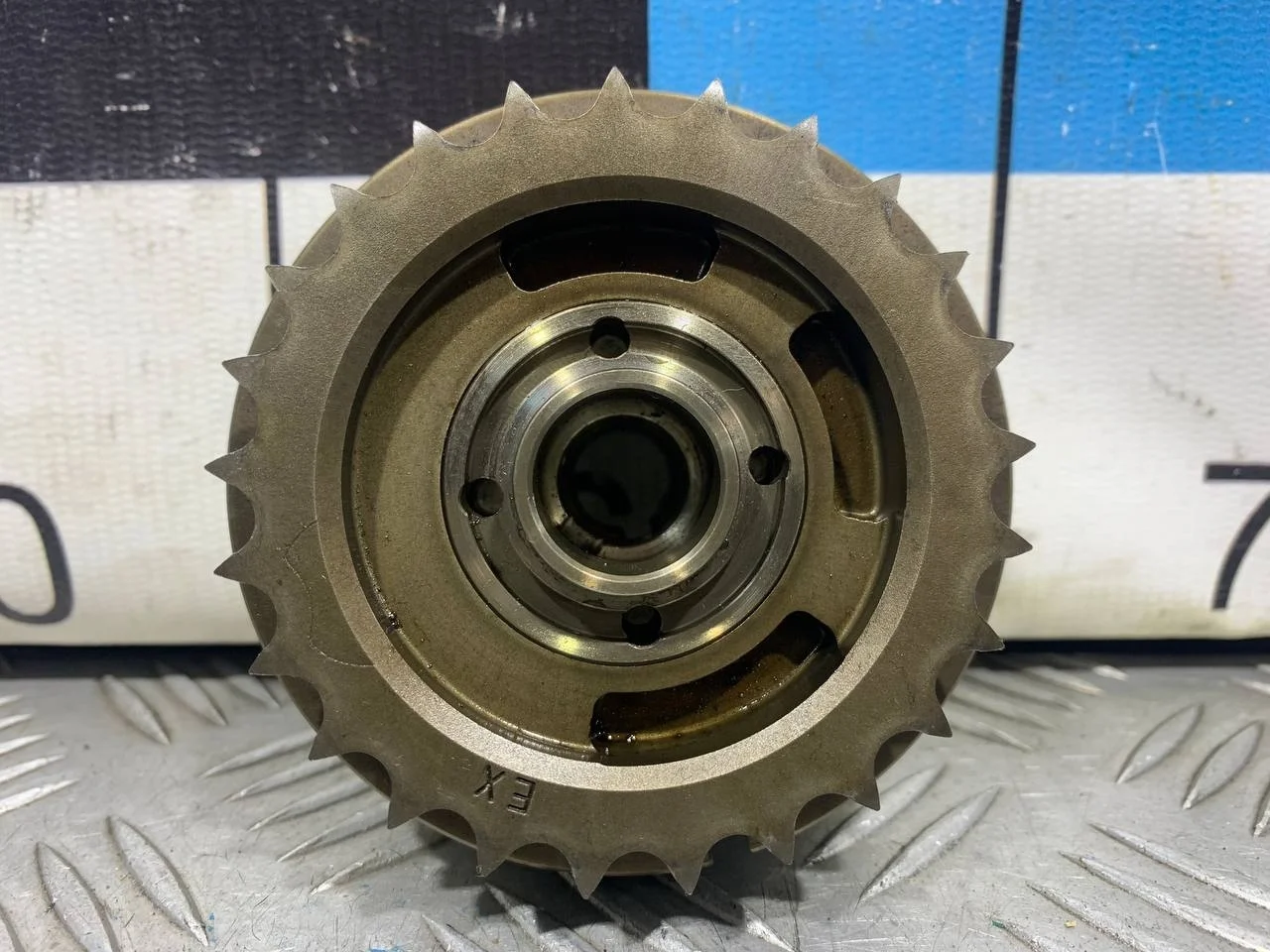 [Б/У] Регулятор фаз газораспределения выпуск - выпуск [Код: 00295426 ]