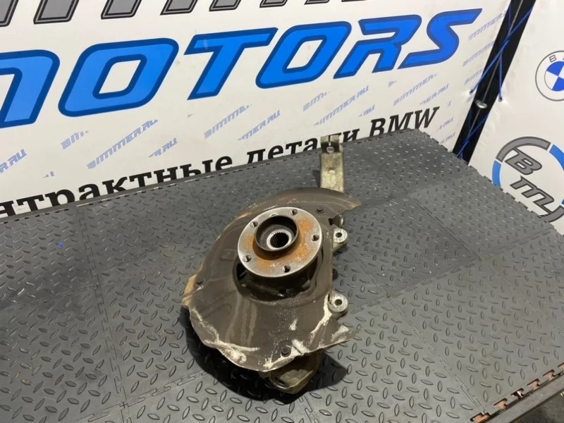 Кулак поворотный Bmw 31216869869 Е70, передний левый