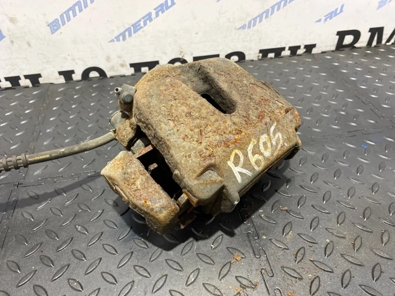 Суппорт тормозной BMW 34116776783 E70, передний левый