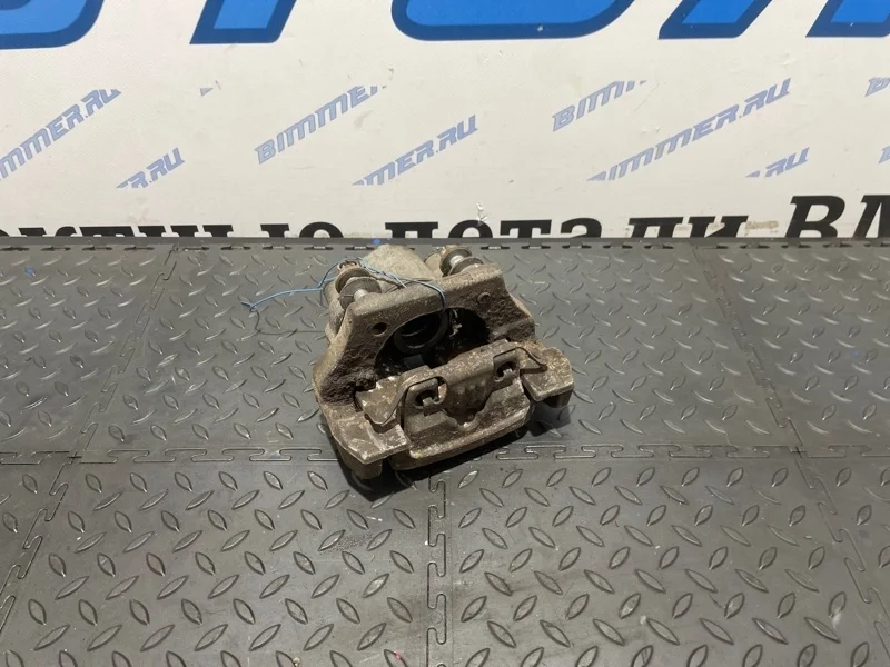 Суппорт тормозной BMW X5 34216776788 E70 N57, задний правый