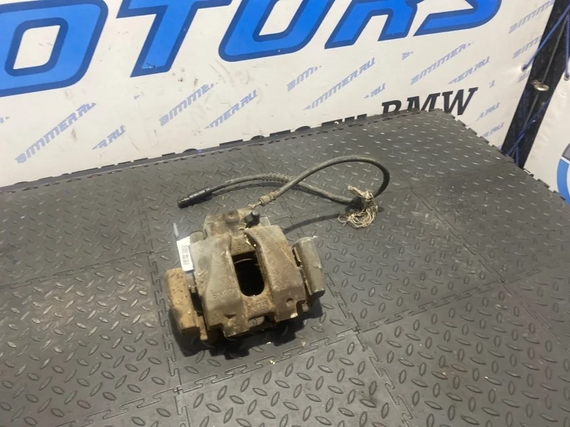 Суппорт тормозной BMW F25