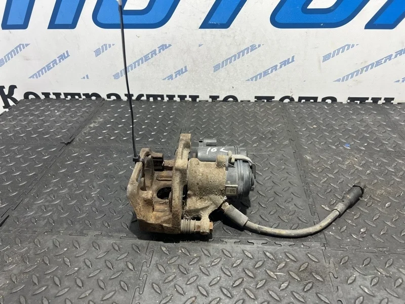 Суппорт тормозной BMW F25