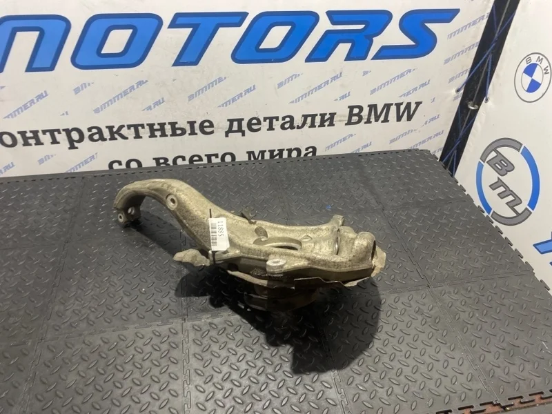 Кулак поворотный Bmw 31216869869 E70, передний левый