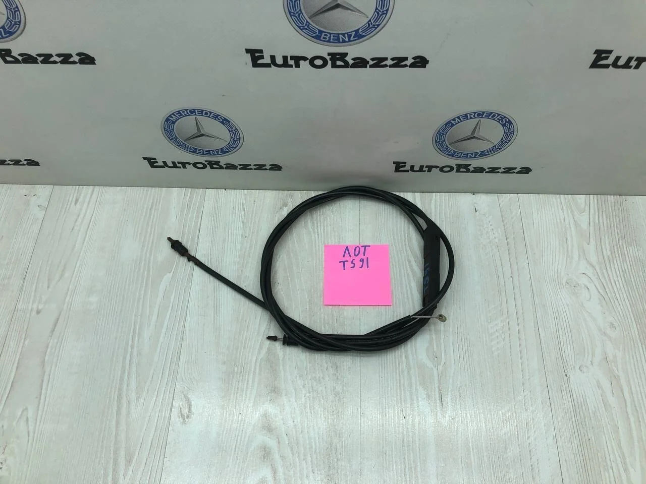 Трос капота спереди Mercedes W203