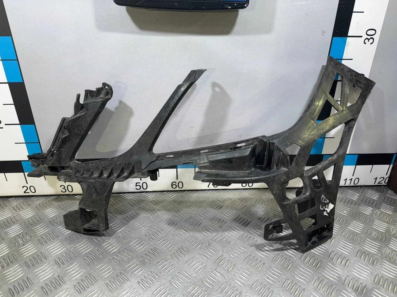 [Б/У] Кронштейн переднего бампера левый Mercedes W212 [Код: 00514899 ]