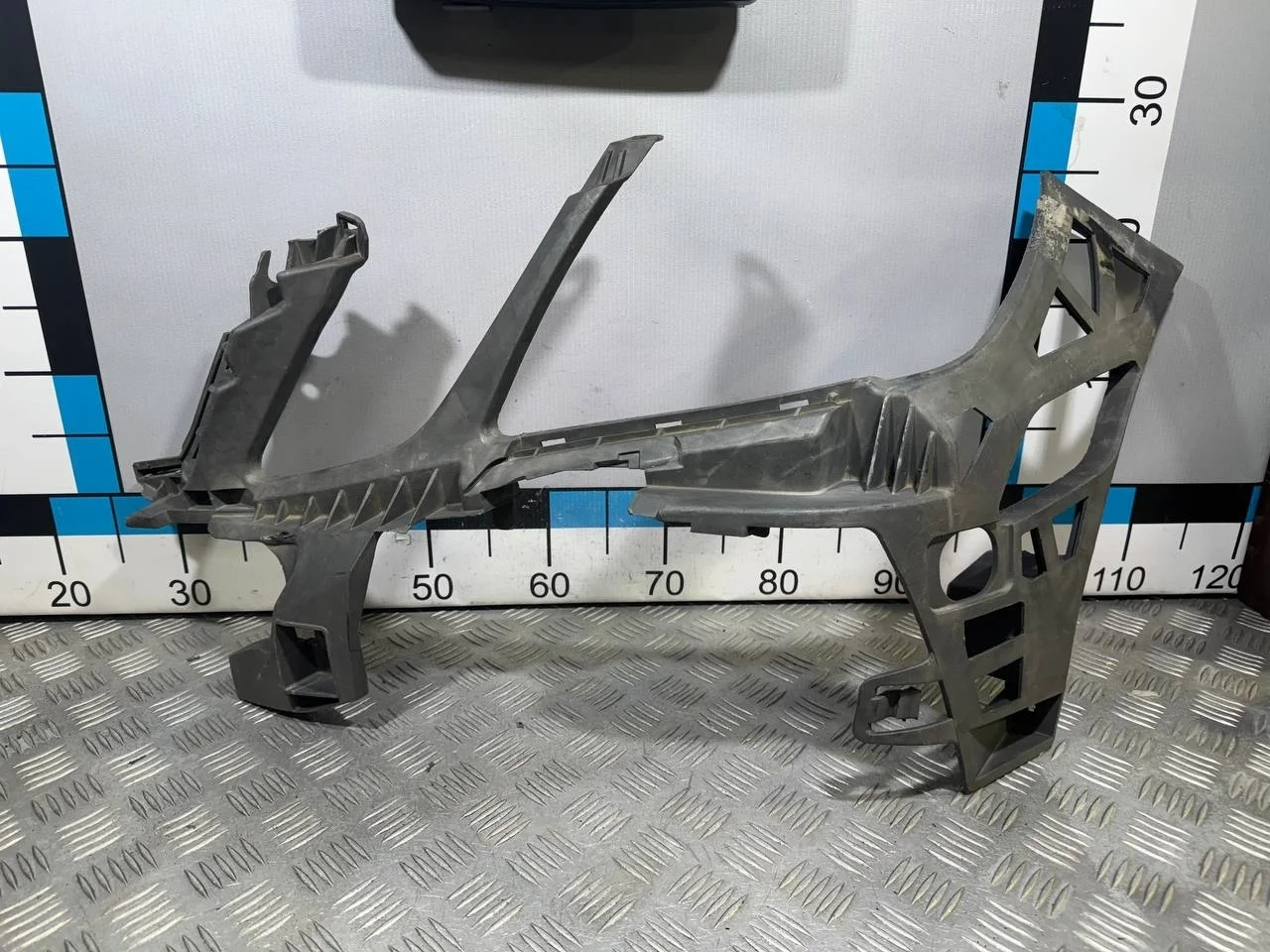 [Б/У] Кронштейн переднего бампера левый Mercedes W212 [Код: 00514923 ]