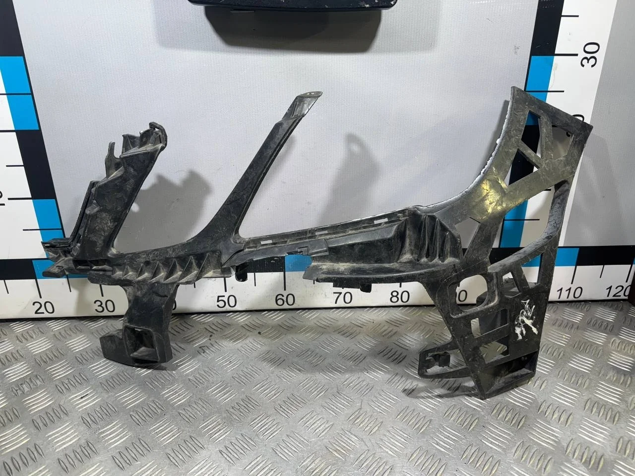 [Б/У] Кронштейн переднего бампера левый Mercedes W212 [Код: 00514959 ]