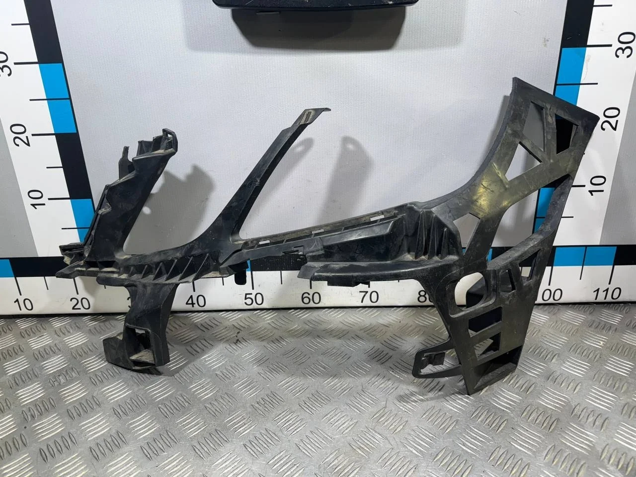 [Б/У] Кронштейн переднего бампера левый Mercedes W212 [Код: 00514962 ]