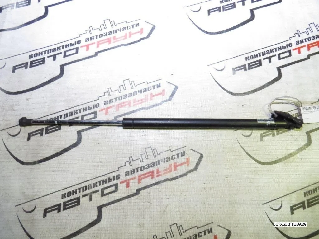 АМОРТИЗАТОР БАГАЖНИКА MAZDA ЛЕВО LC6263620C