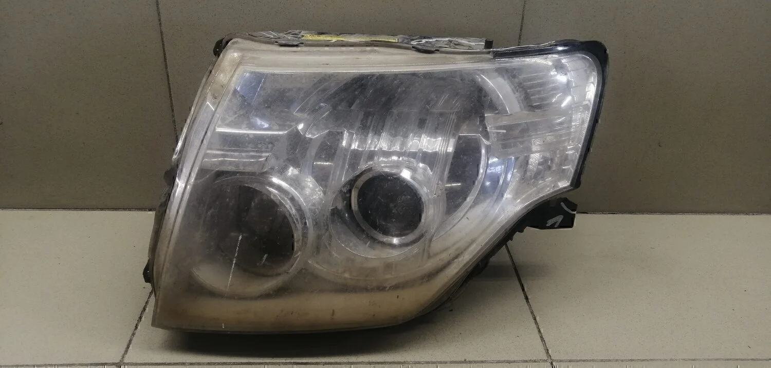 Фара левая Pajero/Montero (V8, V9) 2007>