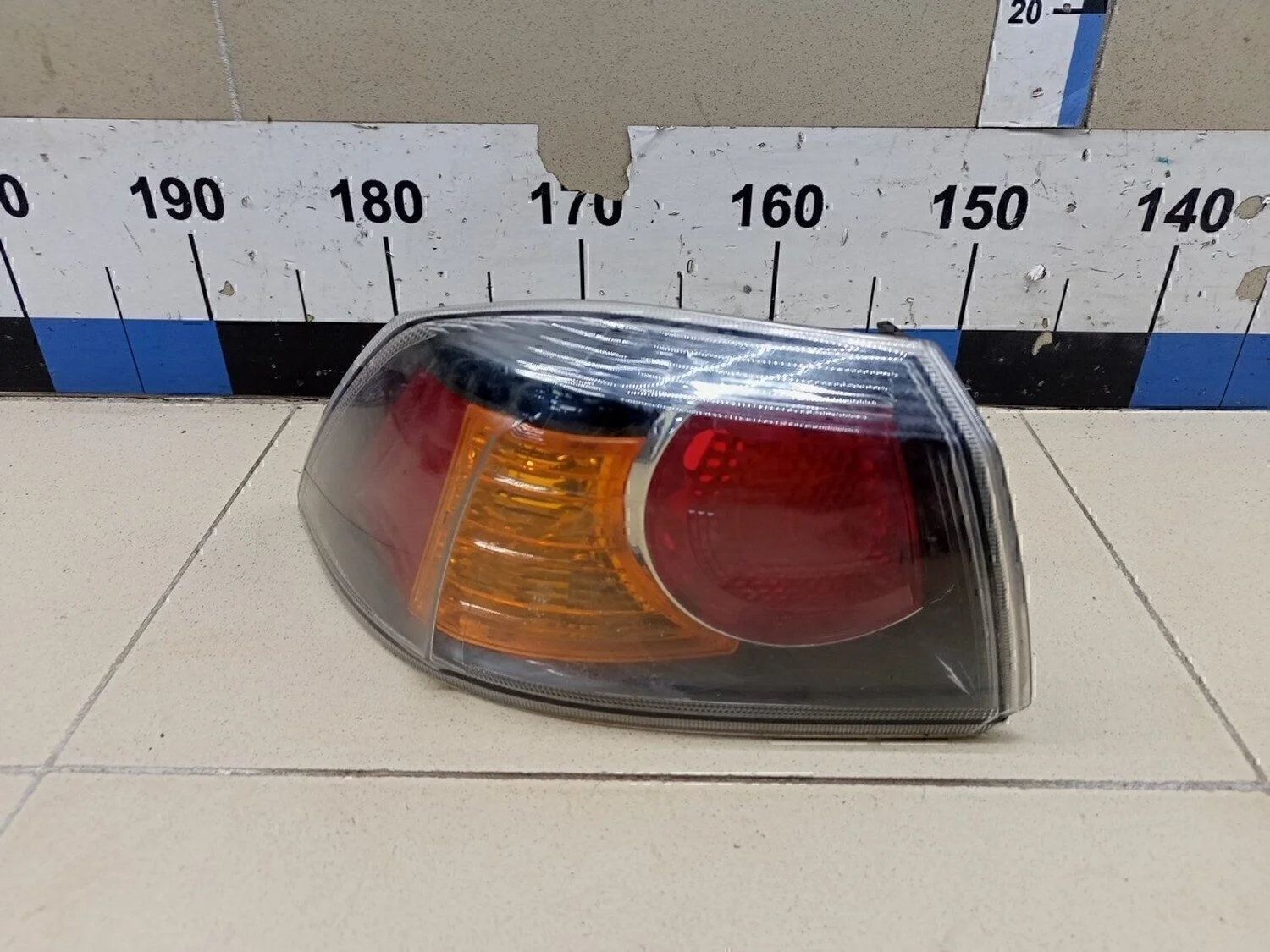 Фонарь задний наружный левый Lancer (CX,CY) 2007>