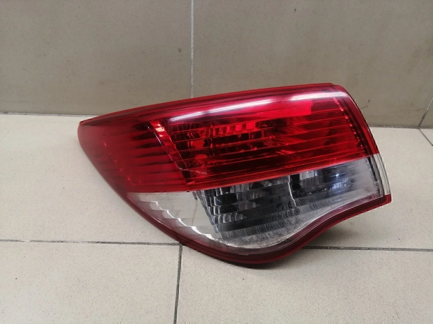 Фонарь задний наружный левый Almera (G15) 2013>