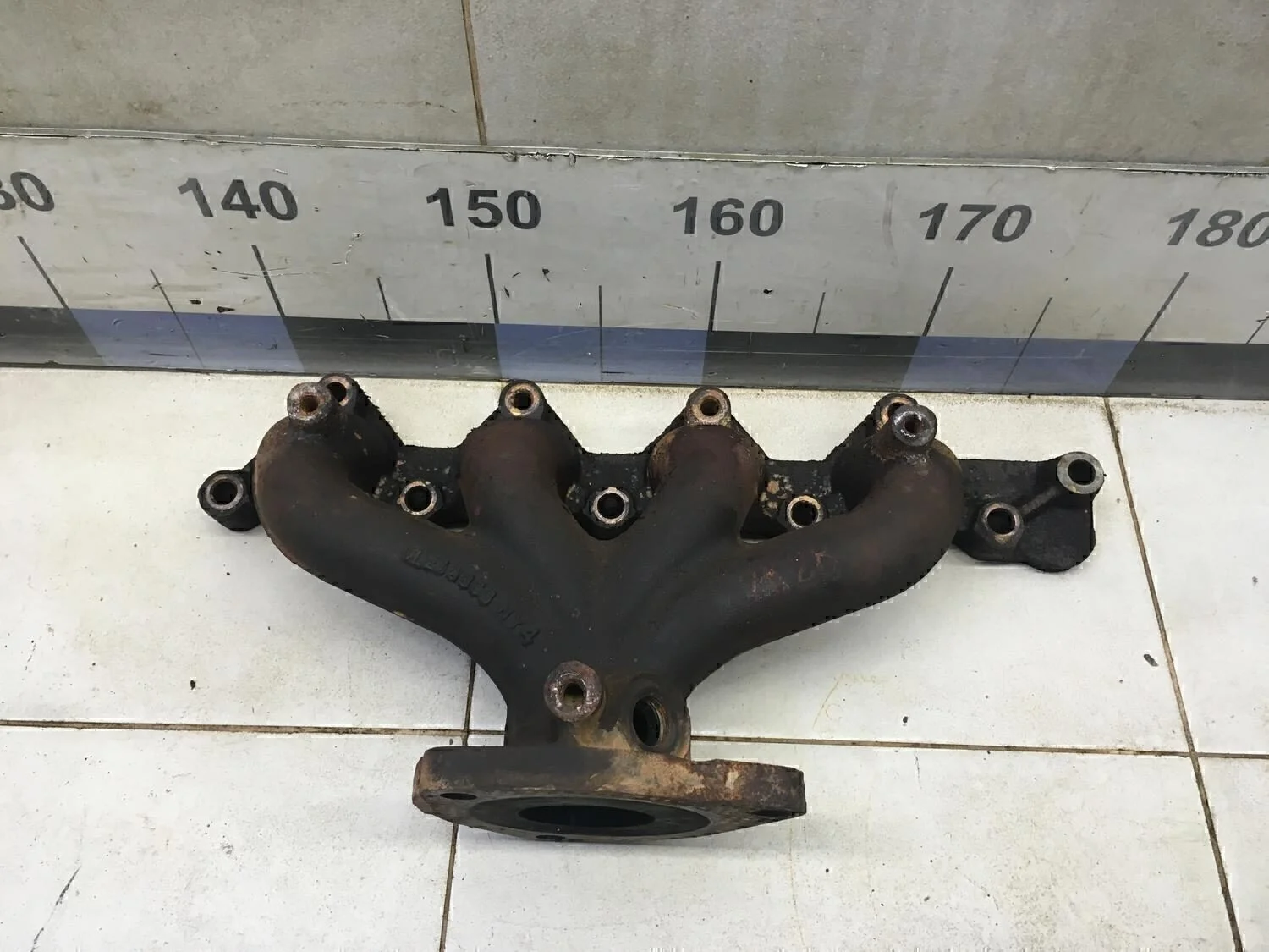 Коллектор выпускной Aveo (T200) 2003-2008