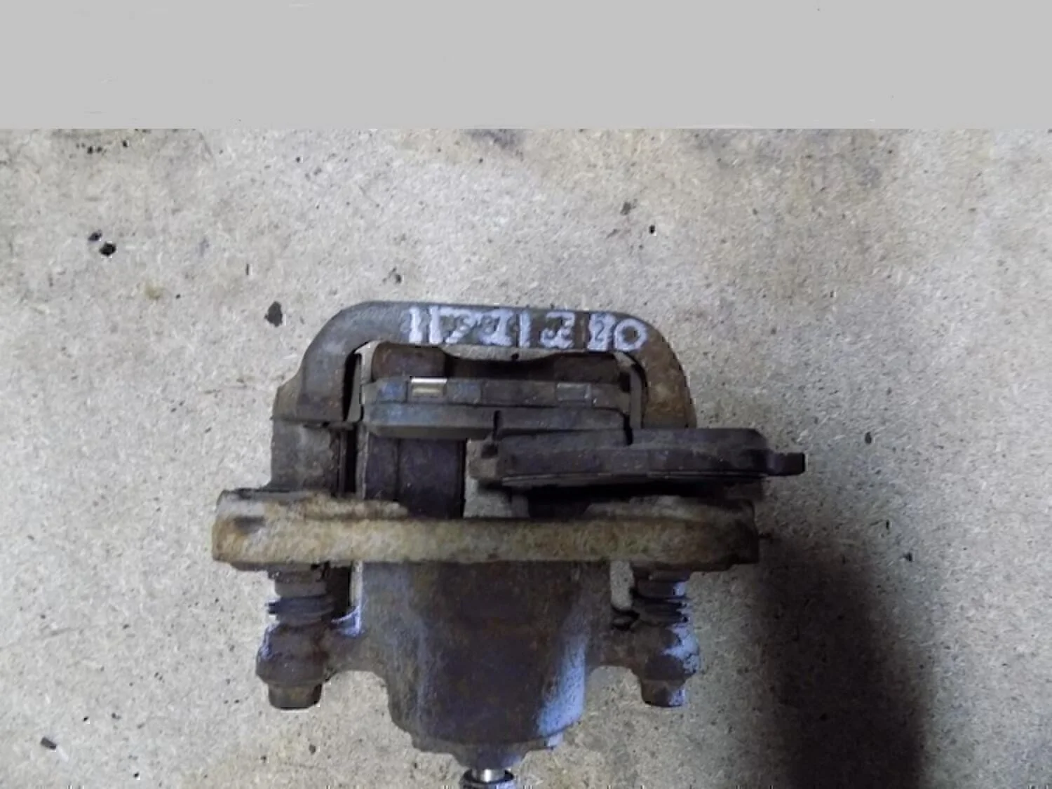 Суппорт задний левый X-Trail (T30) 2001-2006