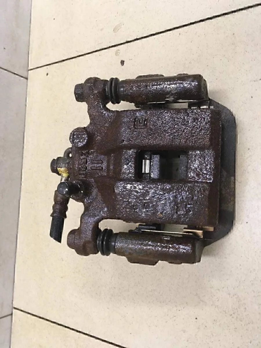 Суппорт задний левый X-Trail (T31) 2007-2014