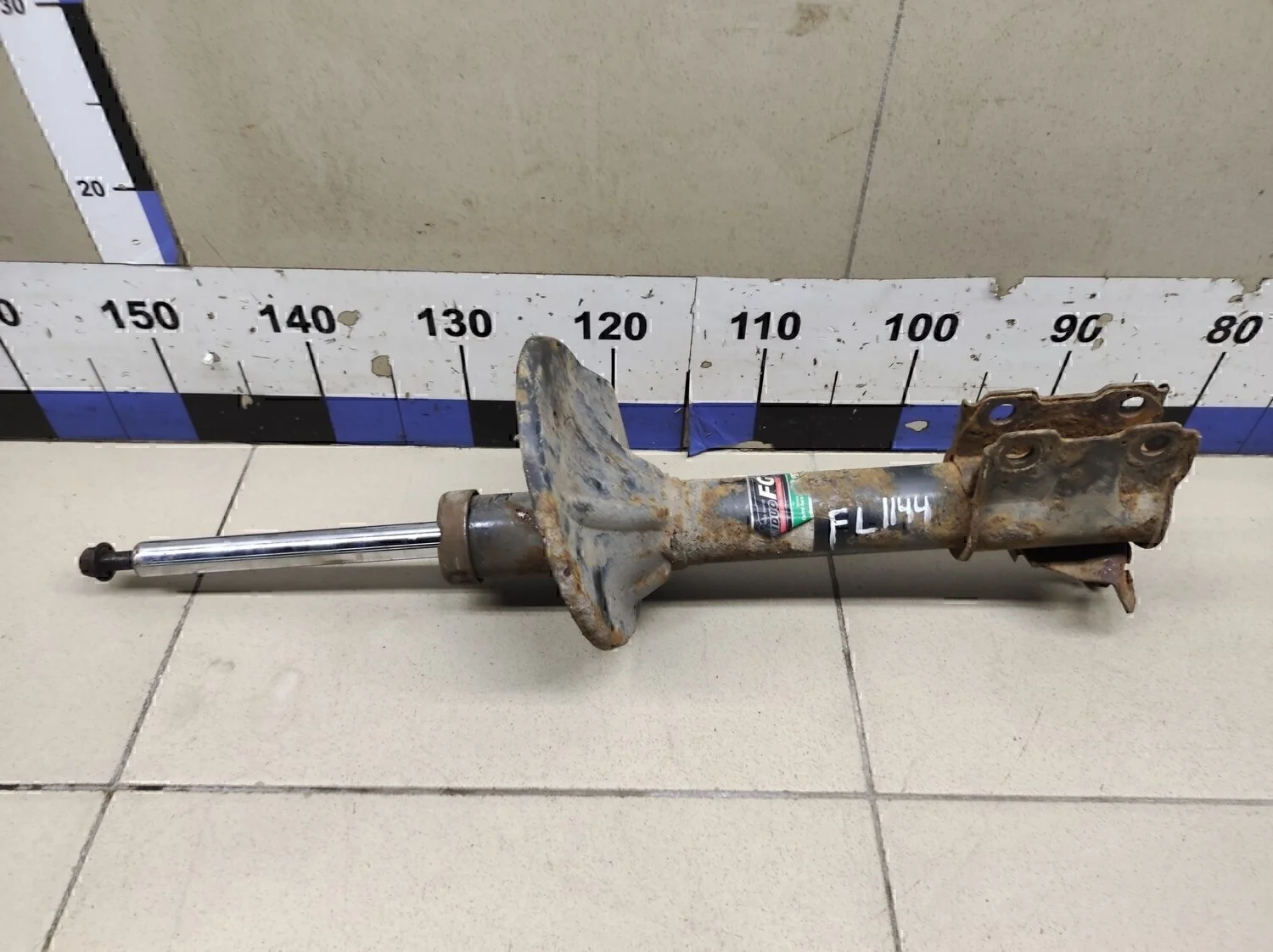 Амортизатор передний Outlander (CU) 2003-2009