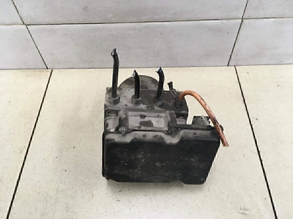 Блок ABS (насос) Tiida (C11) 2007-2014