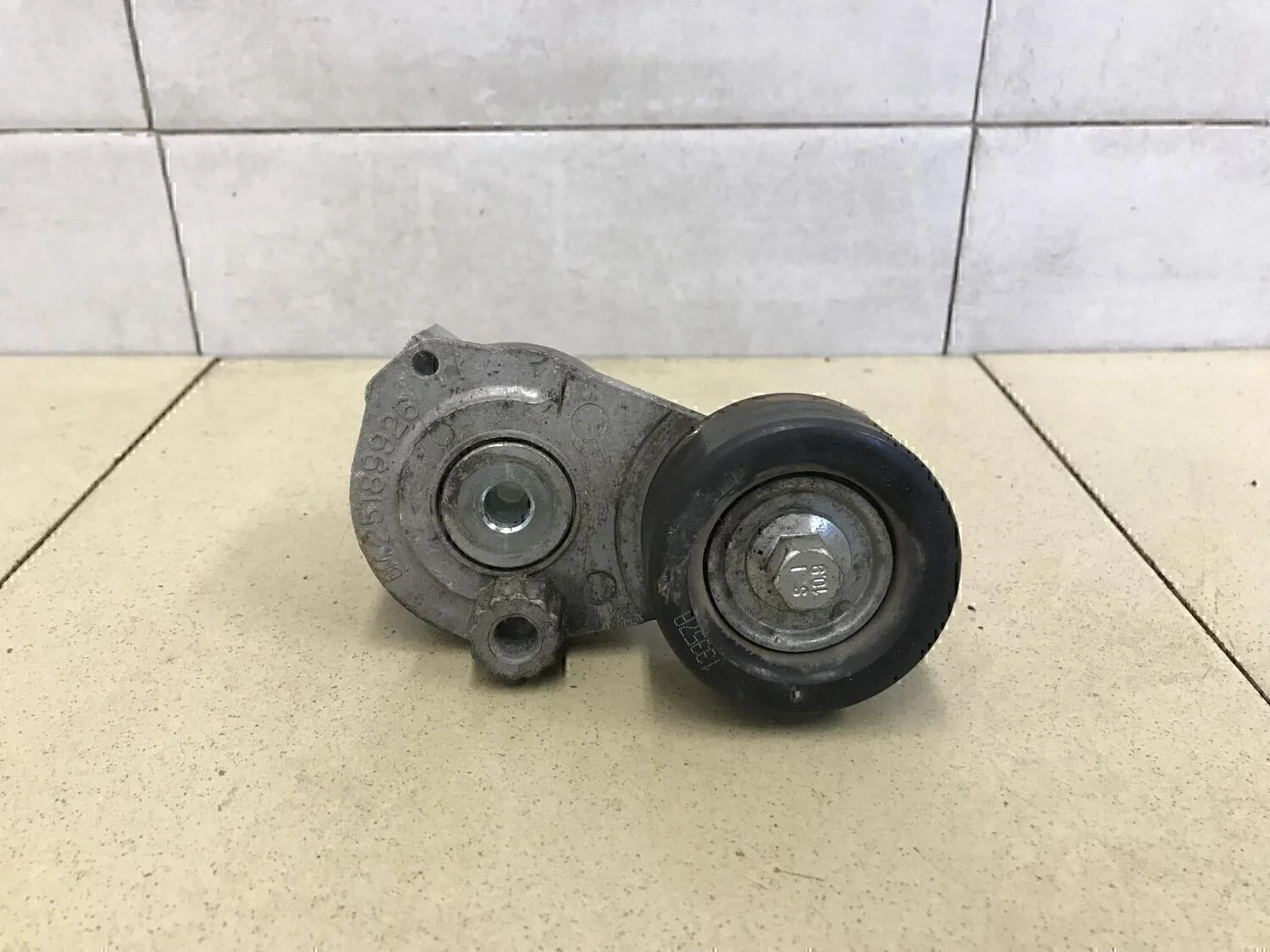 Ролик-натяжитель ручейкового ремня Aveo (T250) 2005-2011