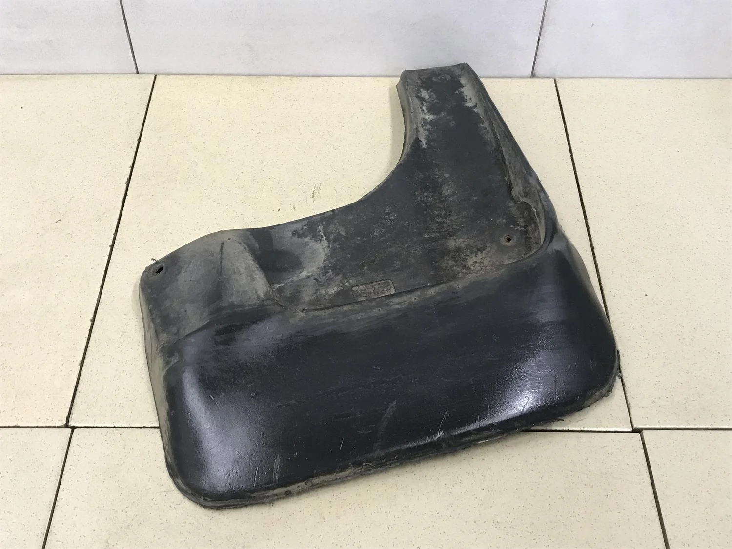 Брызговик передний правый Polo (Sed RUS) 2011>