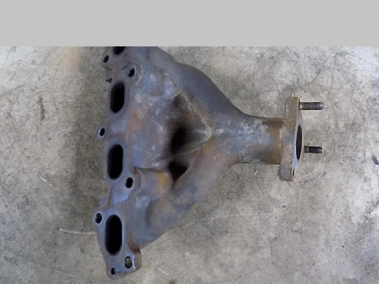 Коллектор выпускной RIO 2000-2004