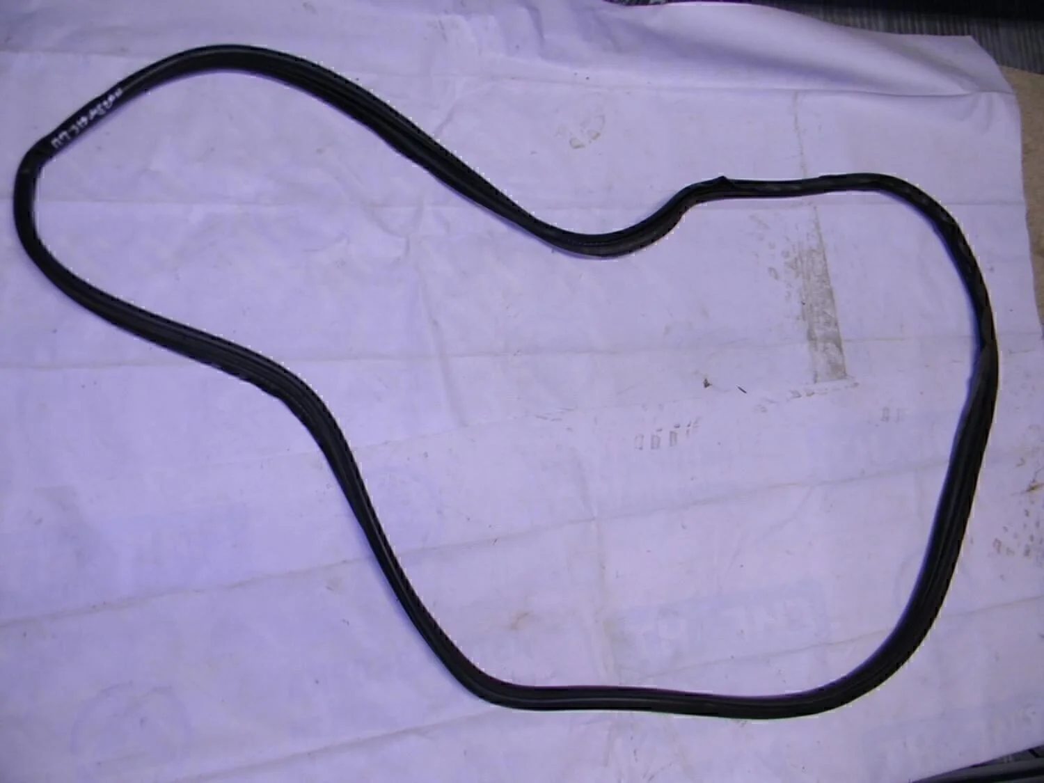 Уплотнитель двери Megane II 2002-2009