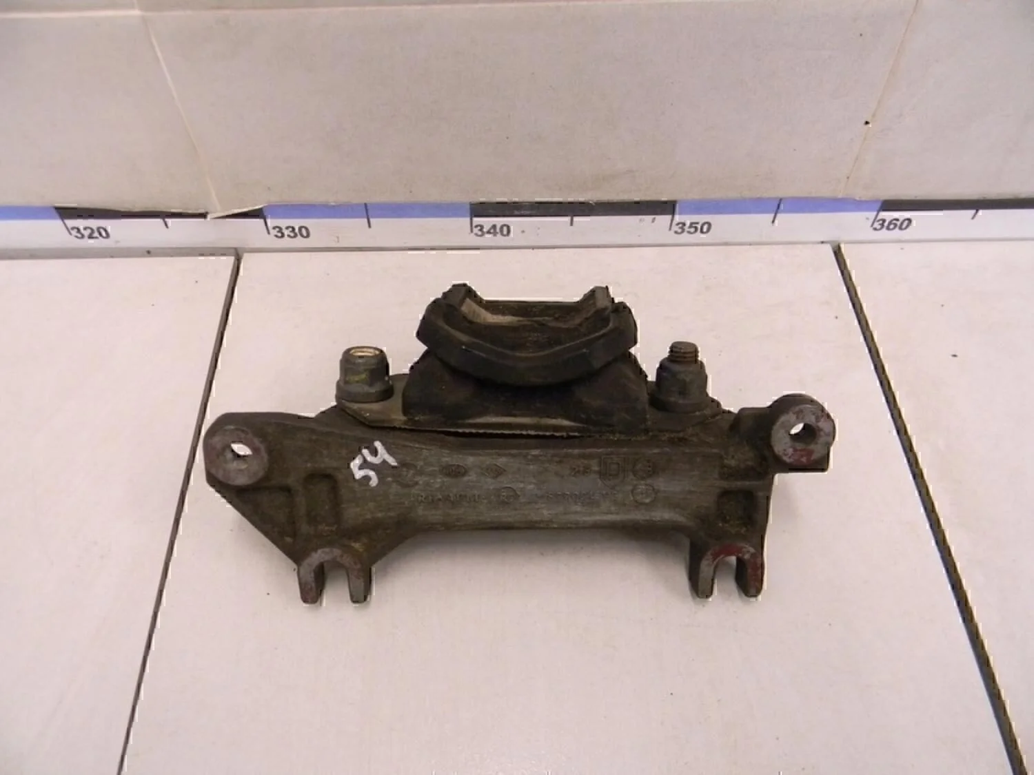 Кронштейн опоры КПП Logan 2005-2014