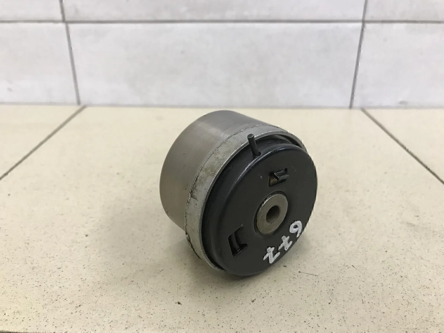 Ролик-натяжитель ремня ГРМ Aveo (T250) 2005-2011