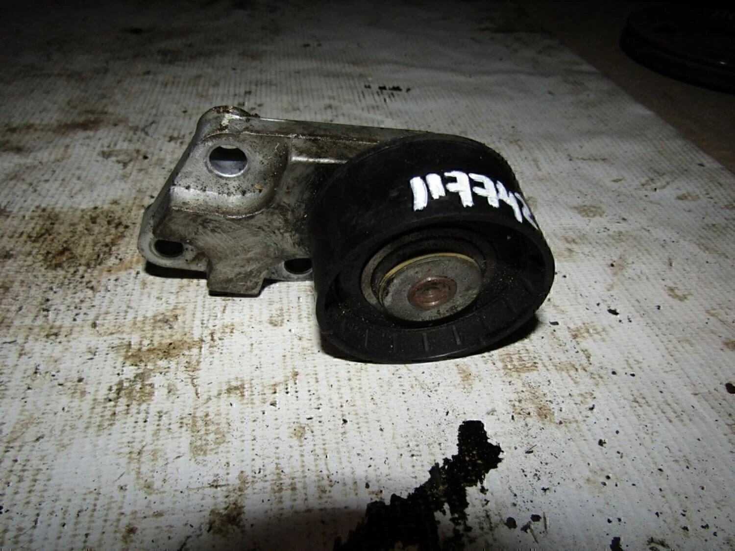 Ролик-натяжитель ремня ГРМ Aveo (T200) 2003-2008